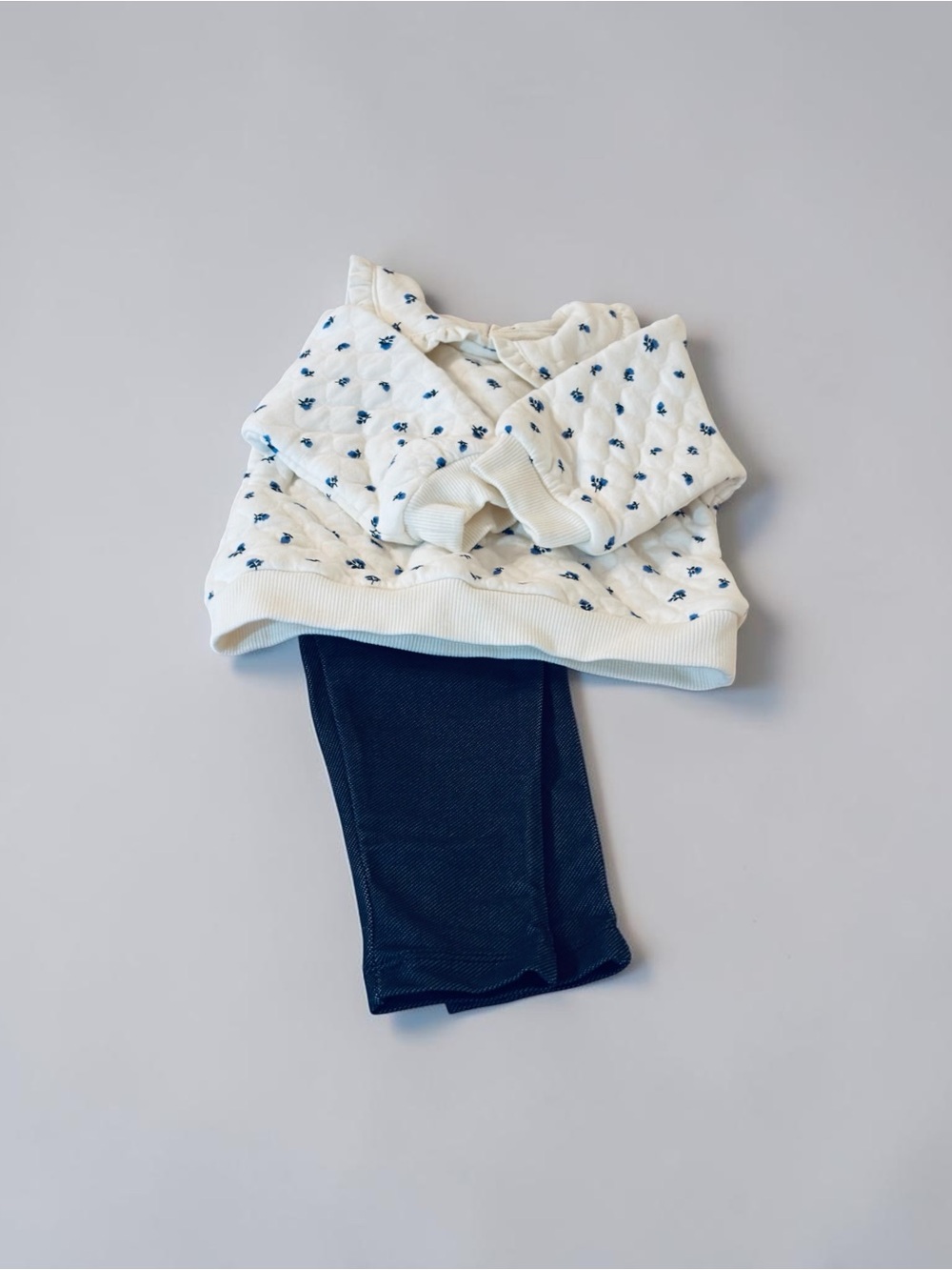 Little Me Cream Top with Blue Floral Print and Navy Accents
